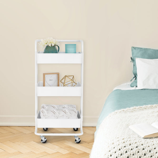 White cart next to bed