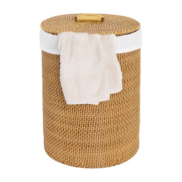 Laundry hamper propped with towel