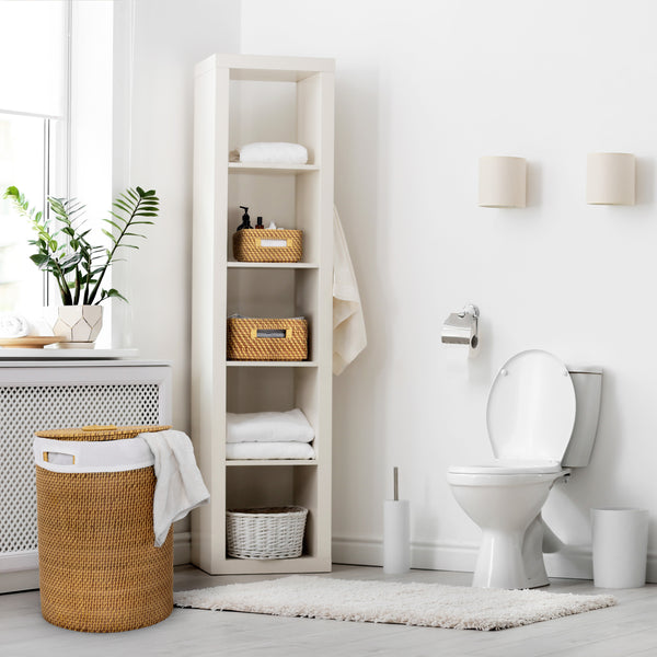 Laundry hampers and basket propped in bathroom