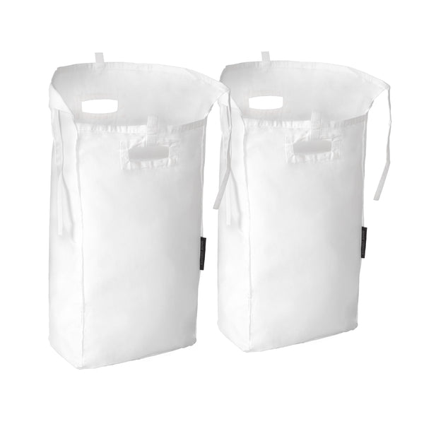 Filled laundry bags on white background