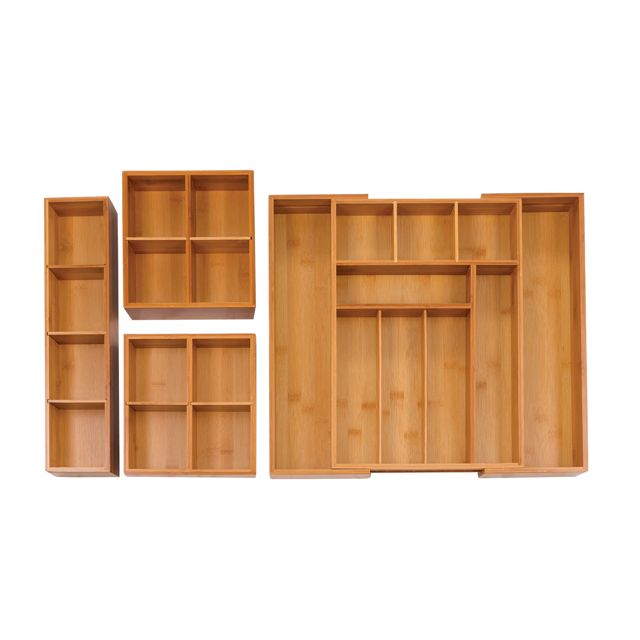Front view of Expanded drawer organizer with box sets on white background