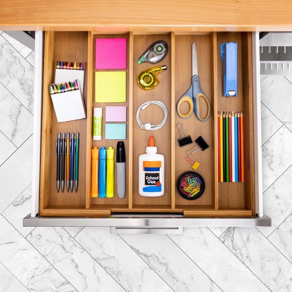 Organizer propped with office supplies