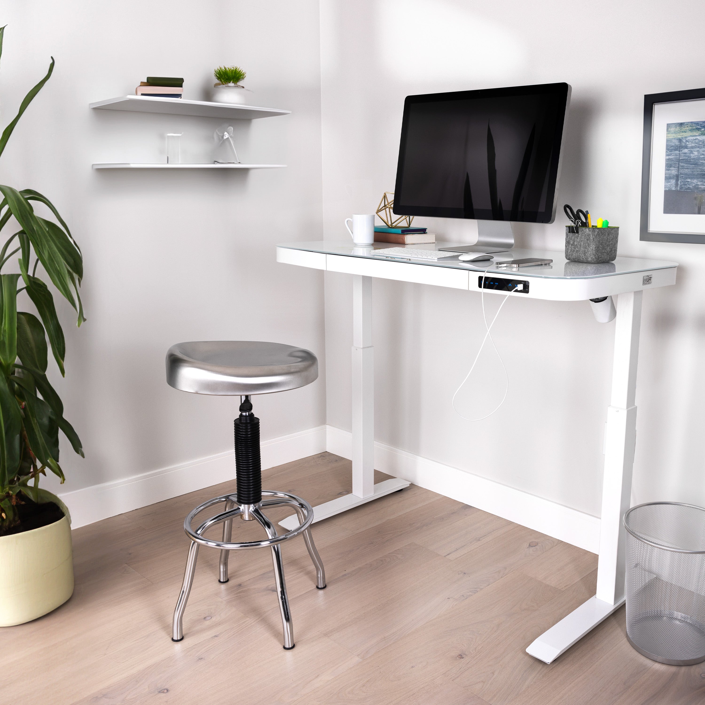 Adjustable desk with shop glass top