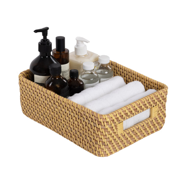 Small basket propped with bathroom supplies