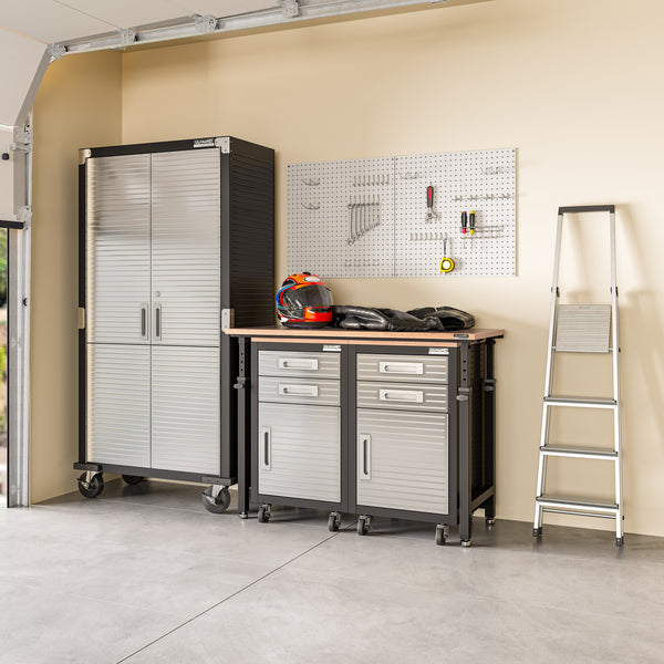 Garage organization system with cabinets, workbench, and tools on a pegboard.
