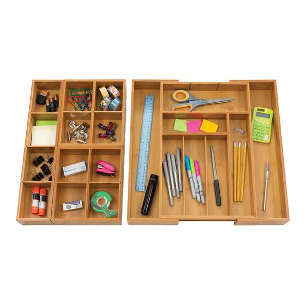 Expanded drawer organizer with box sets propped with office supplies